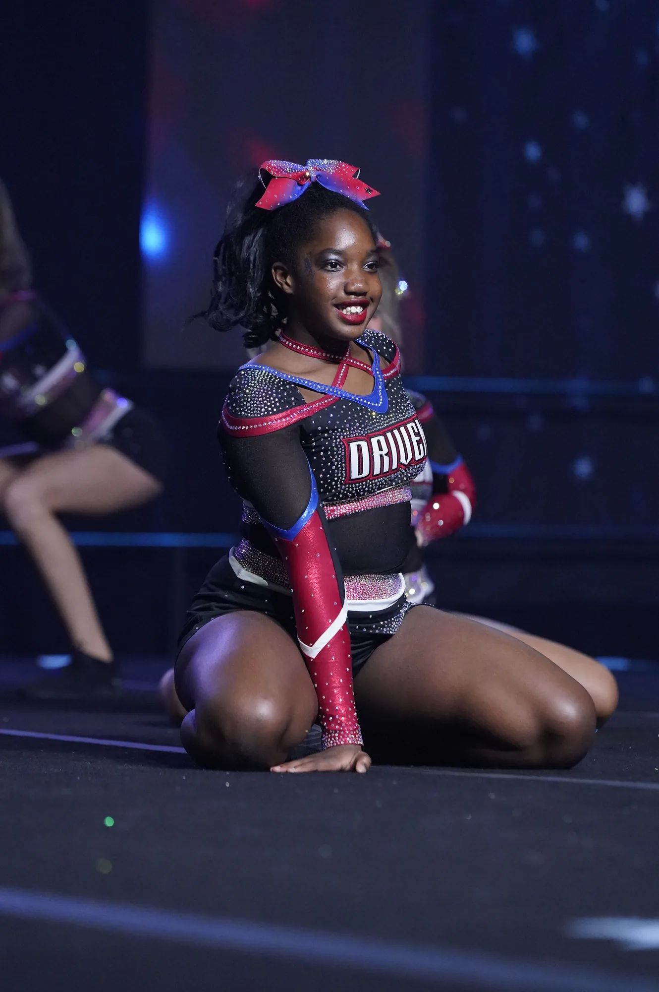 An athlete mid-tumbling pass