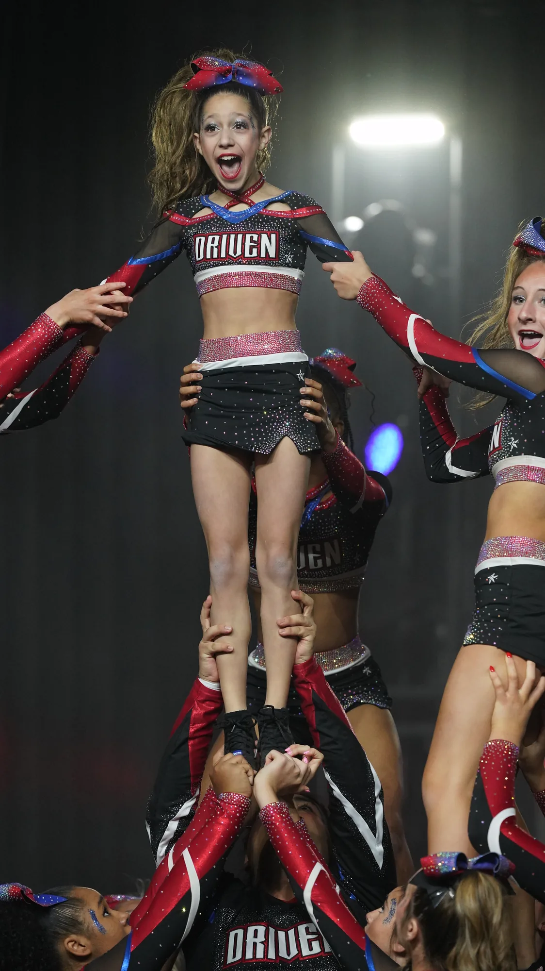 A Driven athlete caught mid-stunt under the lights