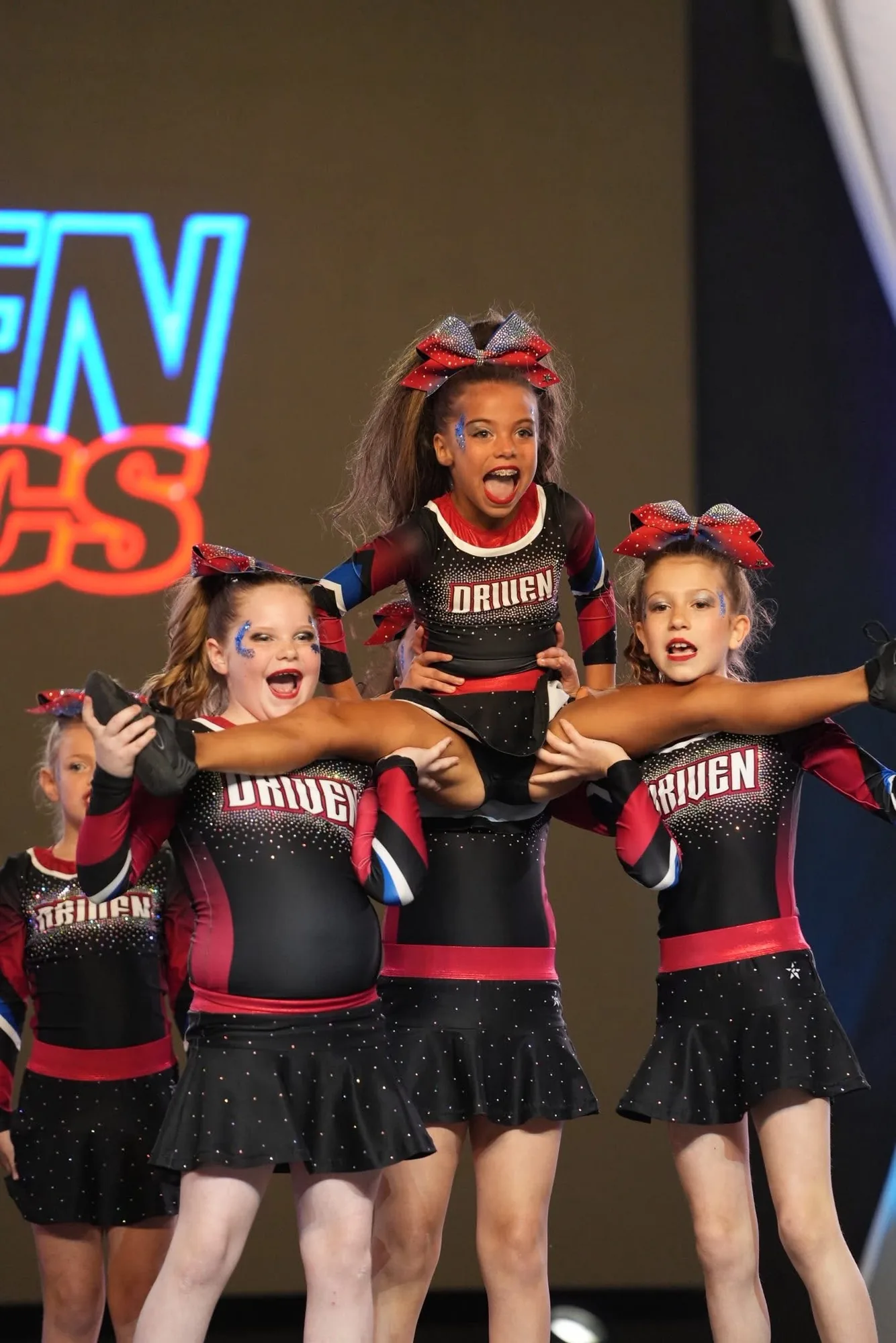 Group stunt on the competition floor