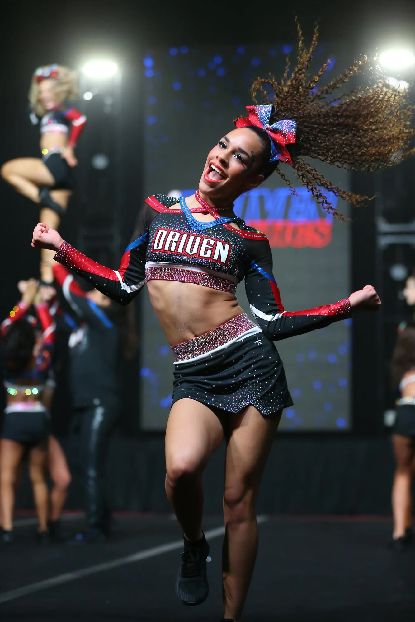A Driven athlete sprints across the floor
